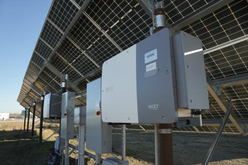 String inverters in the south section converting DC power from solar panels into clean AC energy